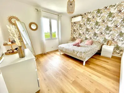 Un ou plusieurs lits dans un hébergement de l'établissement La villa Landaise avec piscine