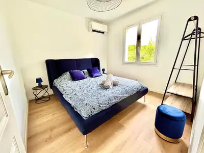 Un ou plusieurs lits dans un hébergement de l'établissement La villa Landaise avec piscine