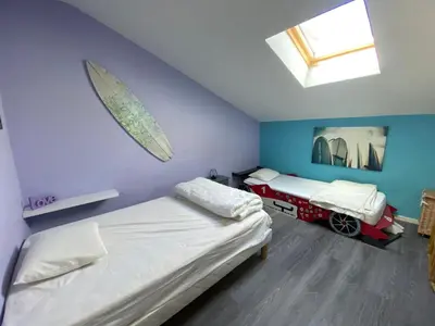 Un ou plusieurs lits dans un hébergement de l'établissement Charmant appartement 2 étoiles vue océan 6p