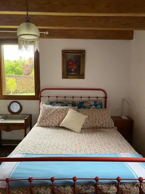 Un ou plusieurs lits dans un hébergement de l'établissement Le chêne magique 40200 Margaux