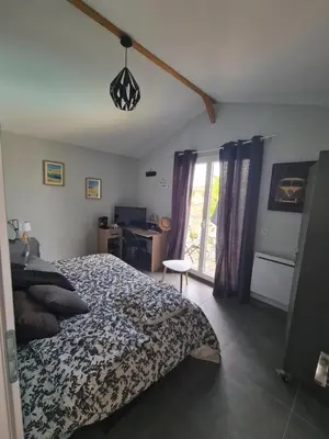 Un ou plusieurs lits dans un hébergement de l'établissement Chambre avec balcon sur La Teste de Buch