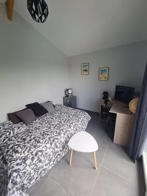Un ou plusieurs lits dans un hébergement de l'établissement Chambre avec balcon sur La Teste de Buch