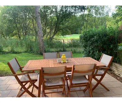 Jardin de l'établissement Maison avec piscine sur le golf - plage à 600m