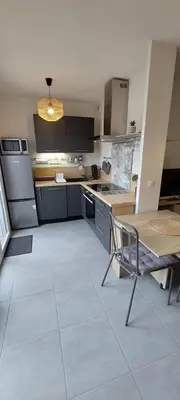 Cuisine ou kitchenette dans l'établissement LouEva