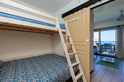 Un ou plusieurs lits dans un hébergement de l'établissement MimiZen - Vue sur locéan la plage de la Garluche