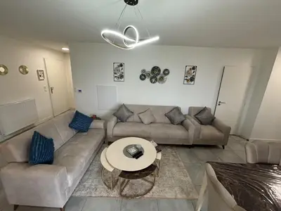 Coin salon dans l'établissement Appartement Biscarrosse