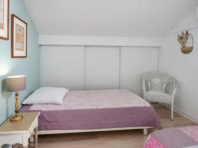 Un ou plusieurs lits dans un hébergement de l'établissement Holiday Home La Chapelle by Interhome