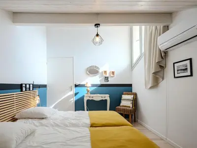 Un ou plusieurs lits dans un hébergement de l'établissement Holiday Home La Chapelle by Interhome