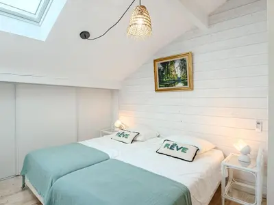 Un ou plusieurs lits dans un hébergement de l'établissement Holiday Home La Chapelle by Interhome