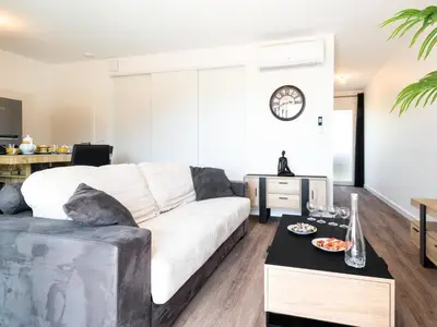 Coin salon dans l'établissement Apartment Jade et Elena-1 by Interhome