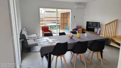 Coin salon dans l'établissement Maison près des plages Cap de l'Homy et Contis 2 vélos disponibles