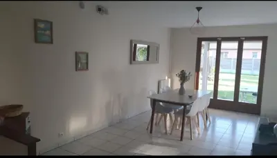 Coin salon dans l'établissement Maison familiale Cazaux