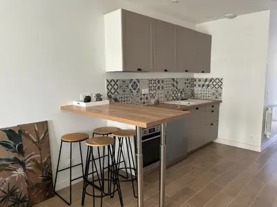 Cuisine ou kitchenette dans l'établissement Welcome sur le Bassin