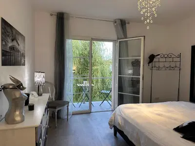 Un ou plusieurs lits dans un hébergement de l'établissement Chambre d hôte village aéronautique Biscarrosse