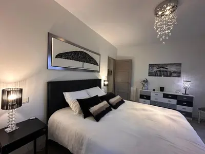 Un ou plusieurs lits dans un hébergement de l'établissement Chambre d hôte village aéronautique Biscarrosse