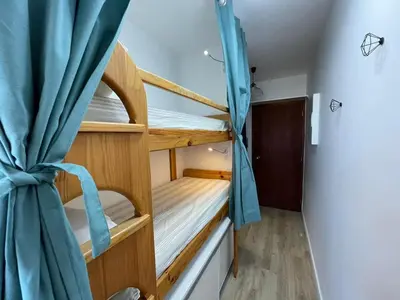 Un ou plusieurs lits dans un hébergement de l'établissement Charmant Studio Rénové au Port de Capbreton - Idéal Pour 4 Pers. - FR-1-413-247
