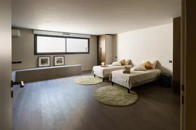 Un ou plusieurs lits dans un hébergement de l'établissement MAISON CHAPRON Villa de standing avec piscine, calme et golf à Biscarrosse