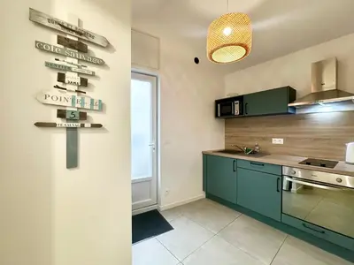 Cuisine ou kitchenette dans l'établissement L'Escale Paisible - Terrasse - Clim - Parking