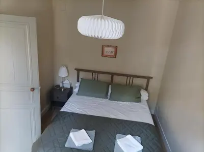 Un ou plusieurs lits dans un hébergement de l'établissement Gîte Villa LORTIN