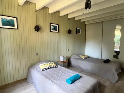 Un ou plusieurs lits dans un hébergement de l'établissement Maison 6 pers 3 Chb avec jardin, proche Golf Hossegor