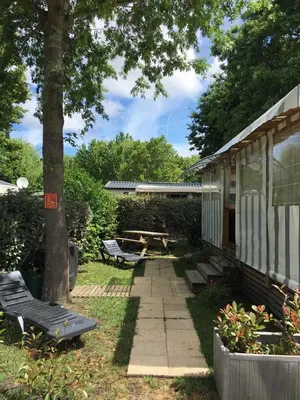 Jardin de l'établissement Mobilhome neuf au camping La Réserve