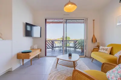 Télévision ou salle de divertissement dans l'établissement L'Ostra - Maison sur l'eau proche Arcachon
