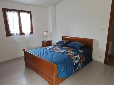 Un ou plusieurs lits dans un hébergement de l'établissement Maison à 20 min des plages Landaises