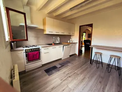 Cuisine ou kitchenette dans l'établissement Maison à 20 min des plages Landaises
