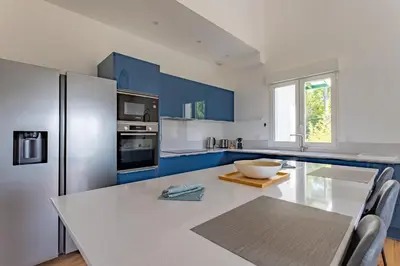 Cuisine ou kitchenette dans l'établissement Le Cocon Des Dunes - Vue mer, Plage&Corniche à pied
