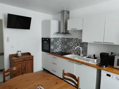 Cuisine ou kitchenette dans l'établissement Gîte familial