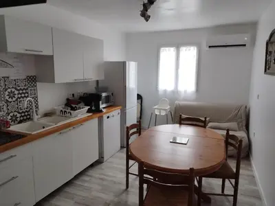 Cuisine ou kitchenette dans l'établissement Gîte familial