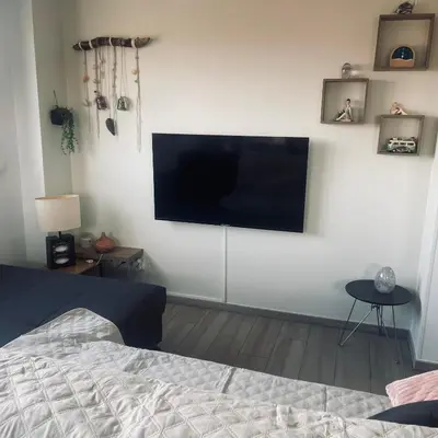Télévision ou salle de divertissement dans l'établissement F3 à mimizan plage