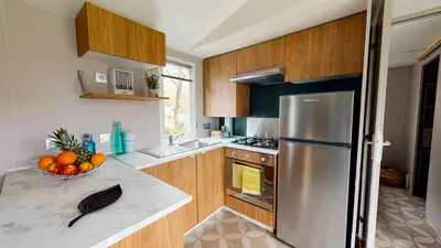 Cuisine ou kitchenette dans l'établissement Camping Officiel Siblu La Pointe