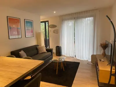 Coin salon dans l'établissement Appartement T2 Pyla-sur-mer