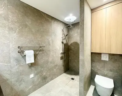 Salle de bains dans l'établissement Au Cœur des Arènes - Parking - Wifi - Clim