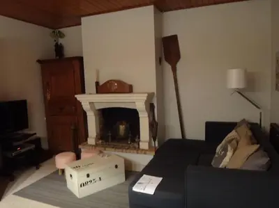 Coin salon dans l'établissement Villa landaise de charme avec piscine chauffée