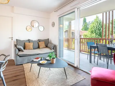 Coin salon dans l'établissement Apartment Jade et Elena-3 by Interhome
