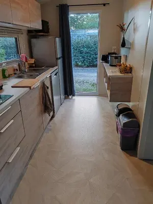 Cuisine ou kitchenette dans l'établissement Cottage Les 2 Chardon