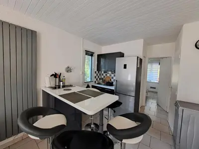Cuisine ou kitchenette dans l'établissement Cottage au cœur des Landes