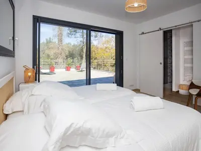 Un ou plusieurs lits dans un hébergement de l'établissement Villa avec Piscine Chauffée à 200m du Lac d'Hossegor - FR-1-791-6