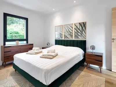 Un ou plusieurs lits dans un hébergement de l'établissement Villa de Luxe à Seignosse: Golf, Piscine Chauffée, Proche Plages - FR-1-791-25