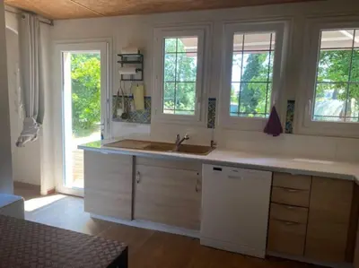 Cuisine ou kitchenette dans l'établissement Vaste appartement, jardin, proximité océan