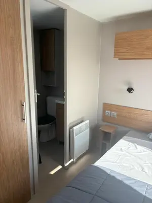 Un ou plusieurs lits dans un hébergement de l'établissement Mobilhome 8 personnes au bord de l'Océan