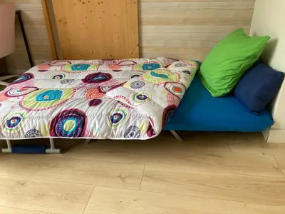 Un ou plusieurs lits dans un hébergement de l'établissement Gîte La Grange de Pardies Classé 2 étoiles