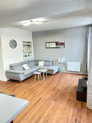 Coin salon dans l'établissement Appartement au centre ville