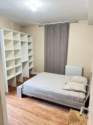 Un ou plusieurs lits dans un hébergement de l'établissement Appartement au centre ville
