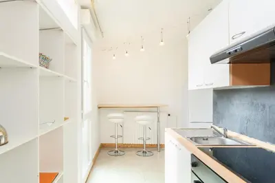 Cuisine ou kitchenette dans l'établissement Appartement charmant et cosy