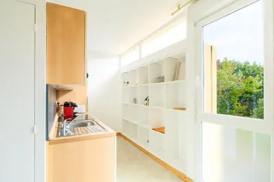 Cuisine ou kitchenette dans l'établissement Appartement charmant et cosy