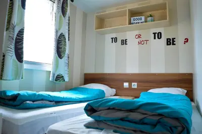 Un ou plusieurs lits dans un hébergement de l'établissement Mobil-home Mick et Stefie