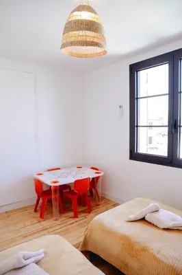 Un ou plusieurs lits dans un hébergement de l'établissement Maison Castor, balnéo et billard chez Ivona Vacances
